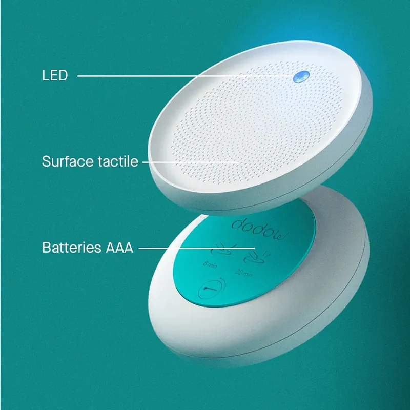 The Dodow opened up, showing the LED array, the touchpad and the battery lid